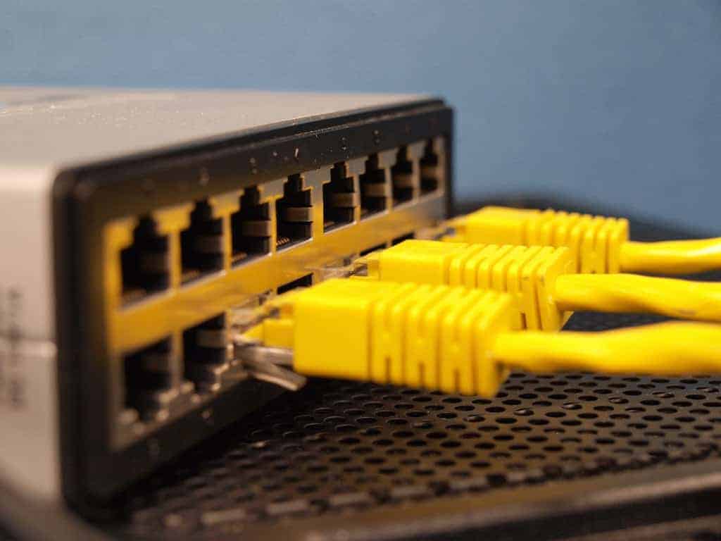 Switches safely add dozens of wired devices to your network. Just make sure the switch can handle the top speed you pay the ISP for. 