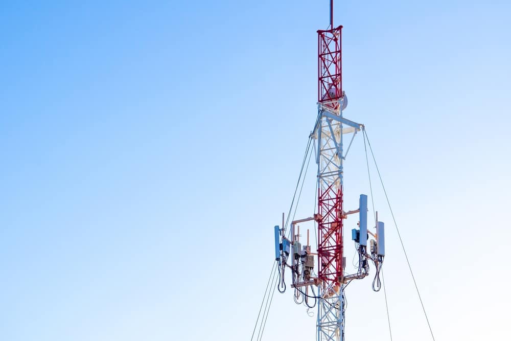 5G repeater tower against the blue sky