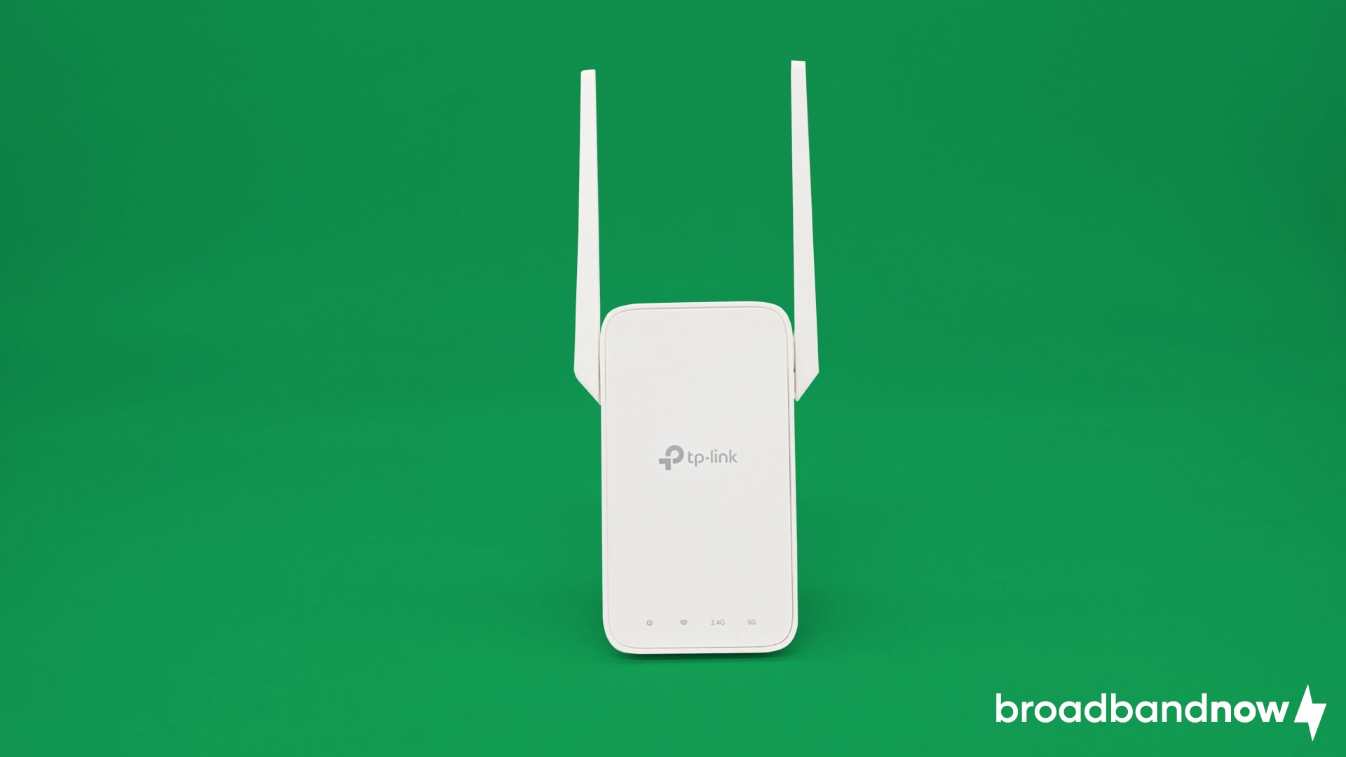 TP-Link RE315 Wi-Fi extender on a green background