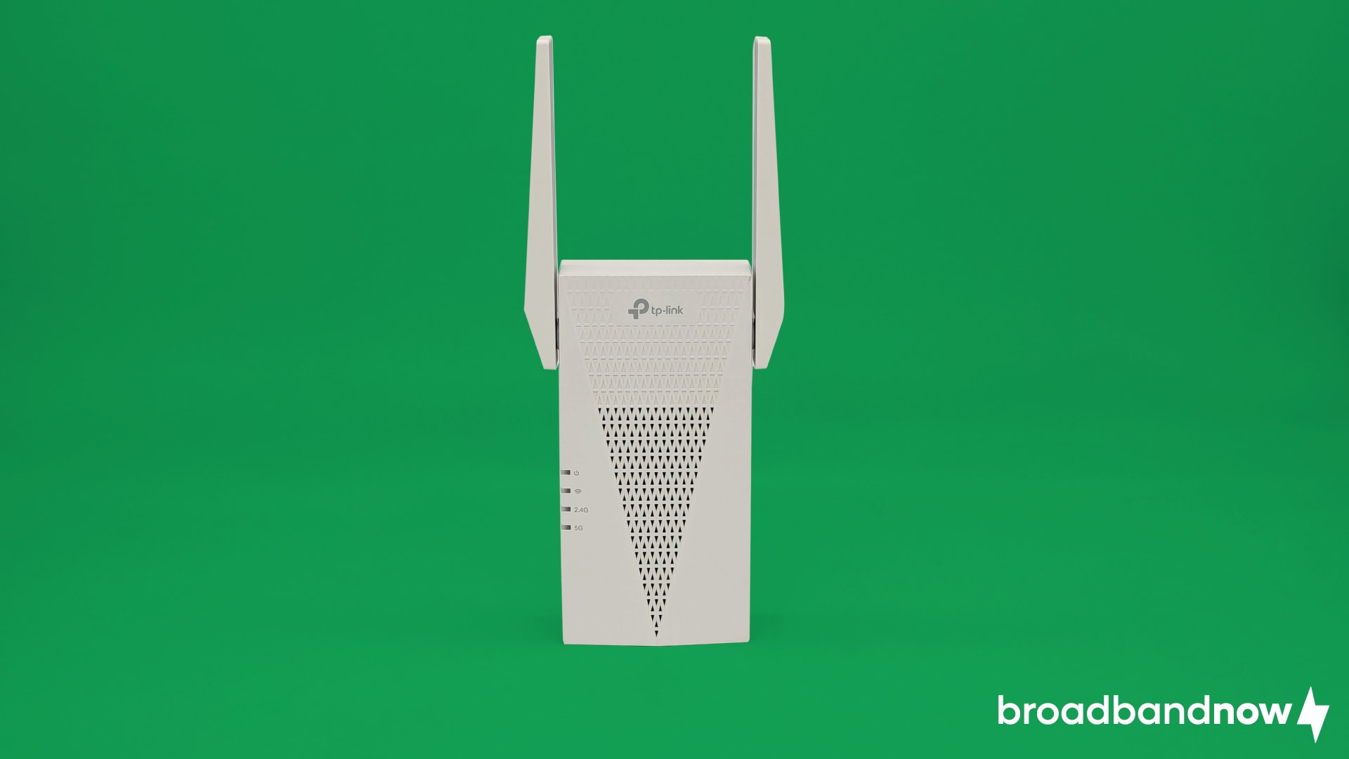 TP-Link RE715X Wi-Fi extender on a green background