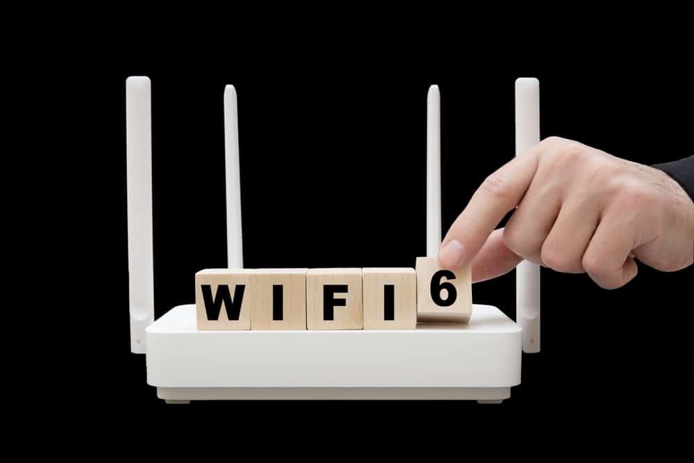 “WIFI6” spelled out via wooden blocks on a router