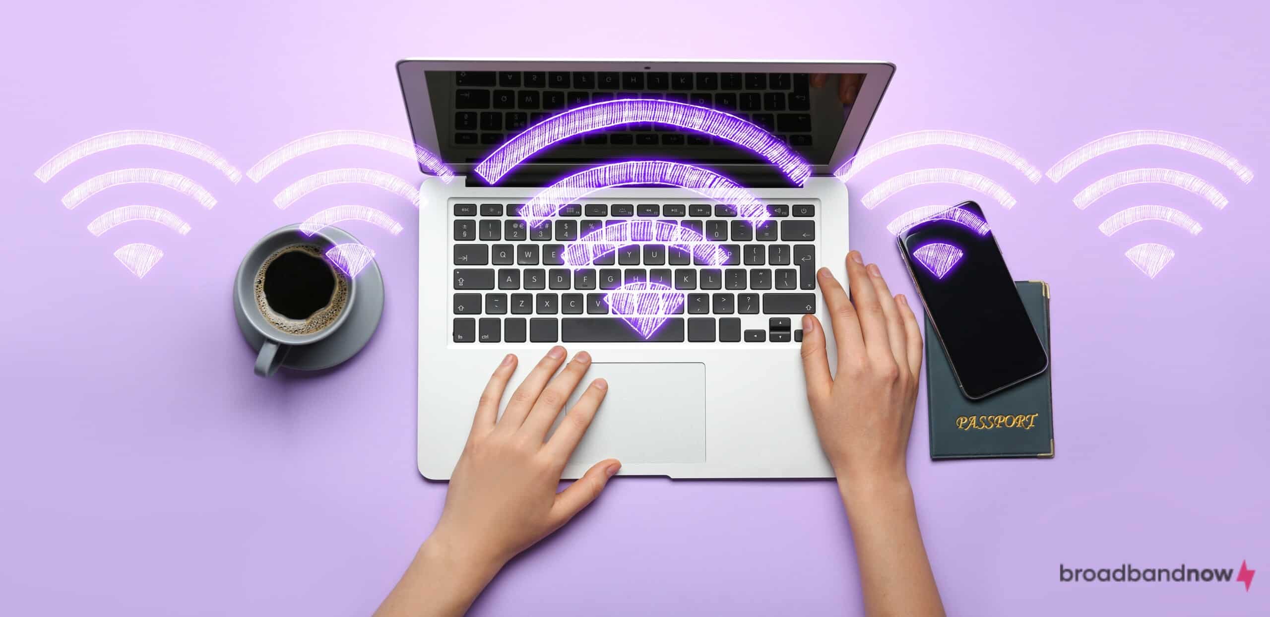 Person typing on a computer with a cup of coffee, phone, and passport sitting on a purple counter, with Wi-Fi bars floating around.