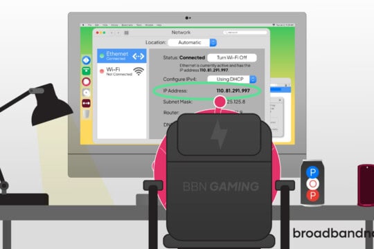 A character mascot sitting in front of a computer.