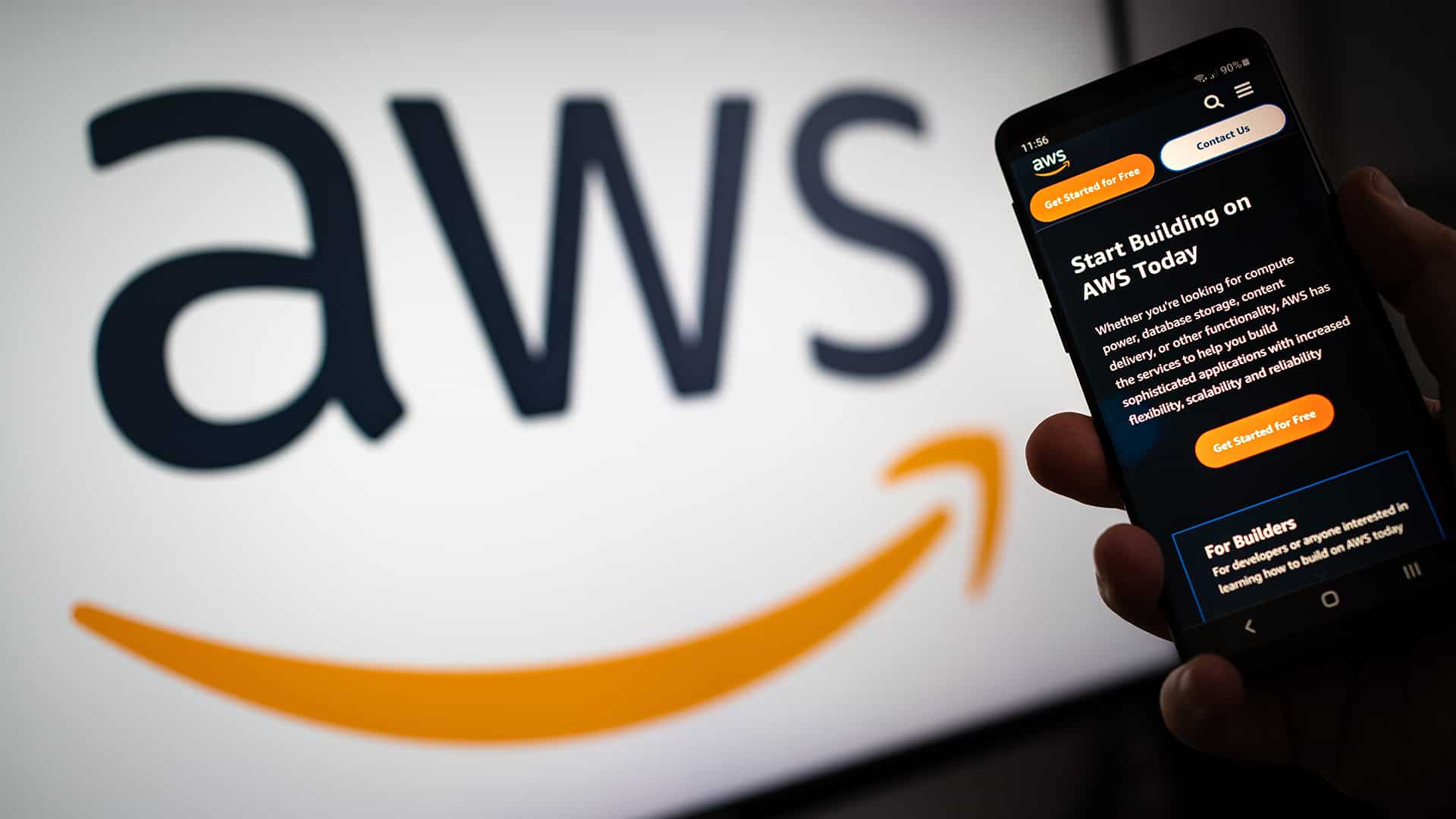 AWS logo in the background and on a phone