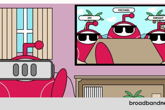 A graphic design image of a character mascot wearing a VR headset and chatting with other characters on a TV screen