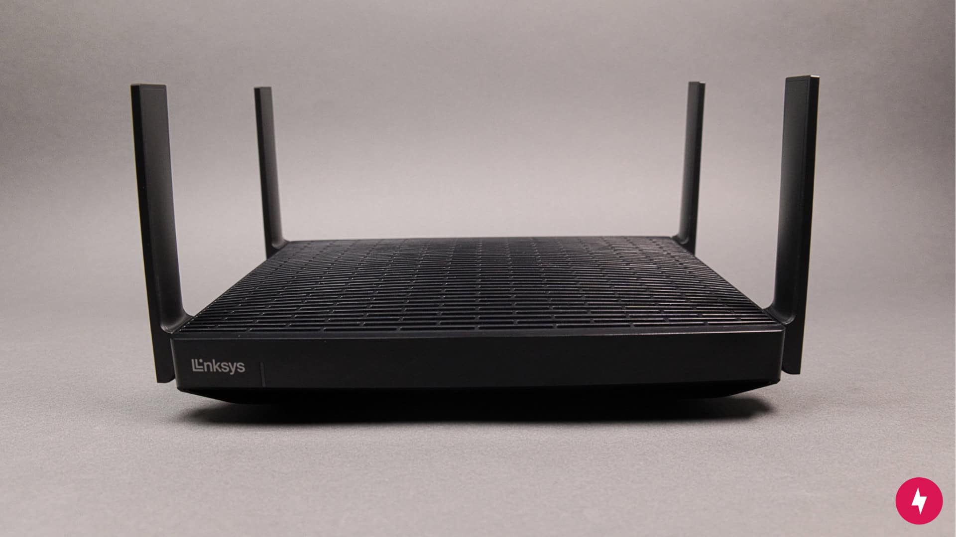 The Linksys Hydra Pro 6E against a gray backdrop.